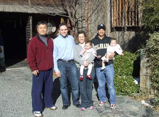 Rob, Class of 98’ and current Nippon Kan Instructor Rudy, Class of 97’;  Alumni uchideshi with their babies.