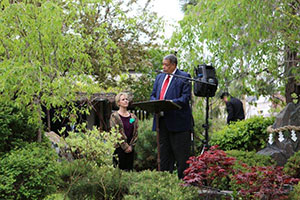 A Man Standing in Front of a Podium