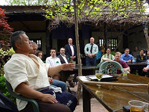 A Group of People Sitting Around a Table