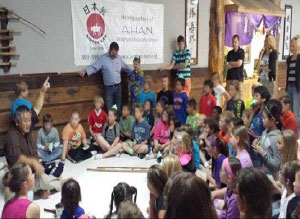 A Group of Children Gathered Around on a Floor