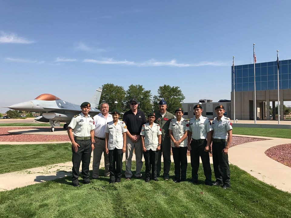 A Group of People in Uniform Standing on a Field